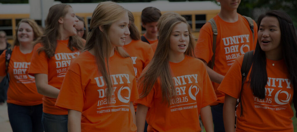 Students wearing coordinated school uniforms outdoors